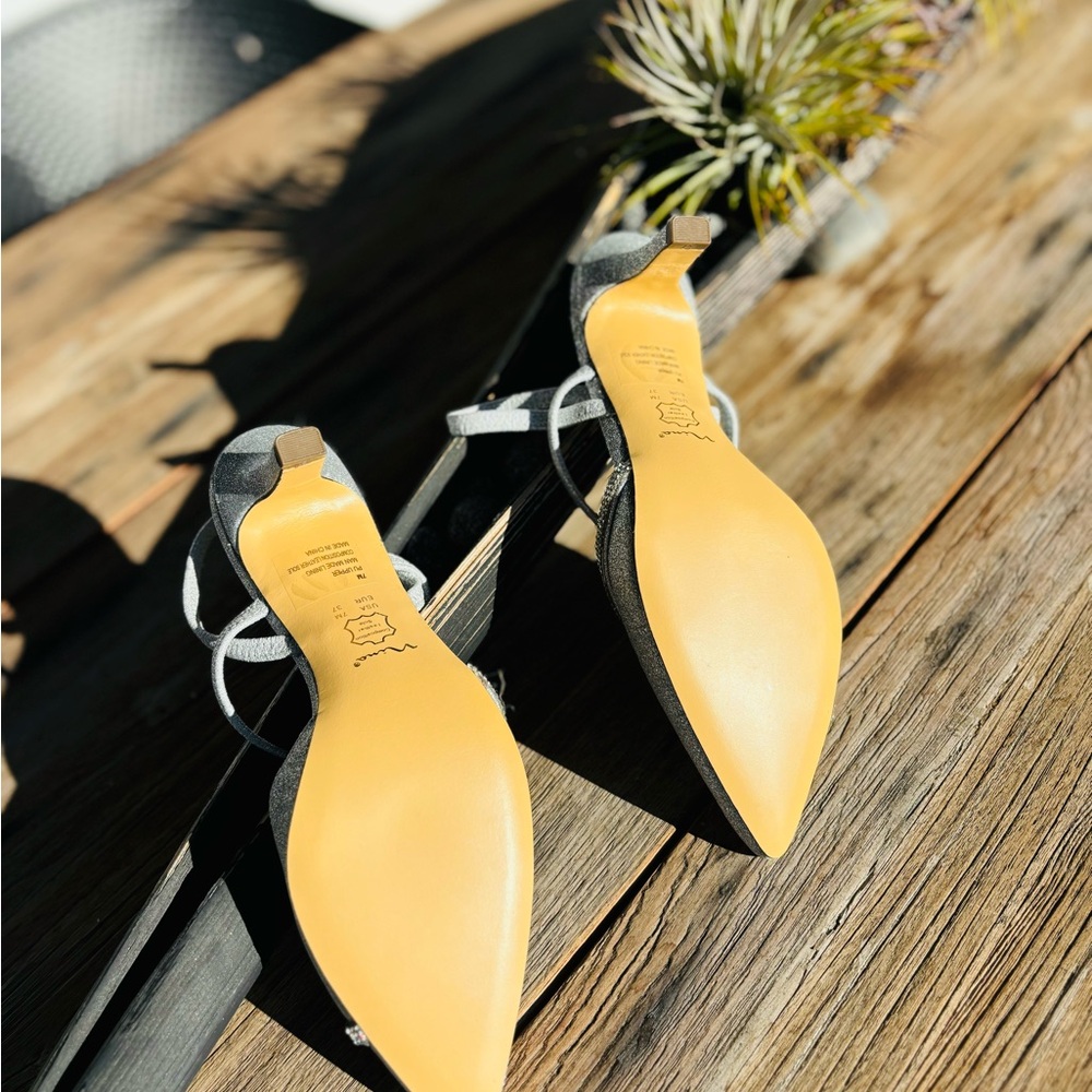 Pre-owed Mino sling back pumps , size 7, silver color , brand new, never worn